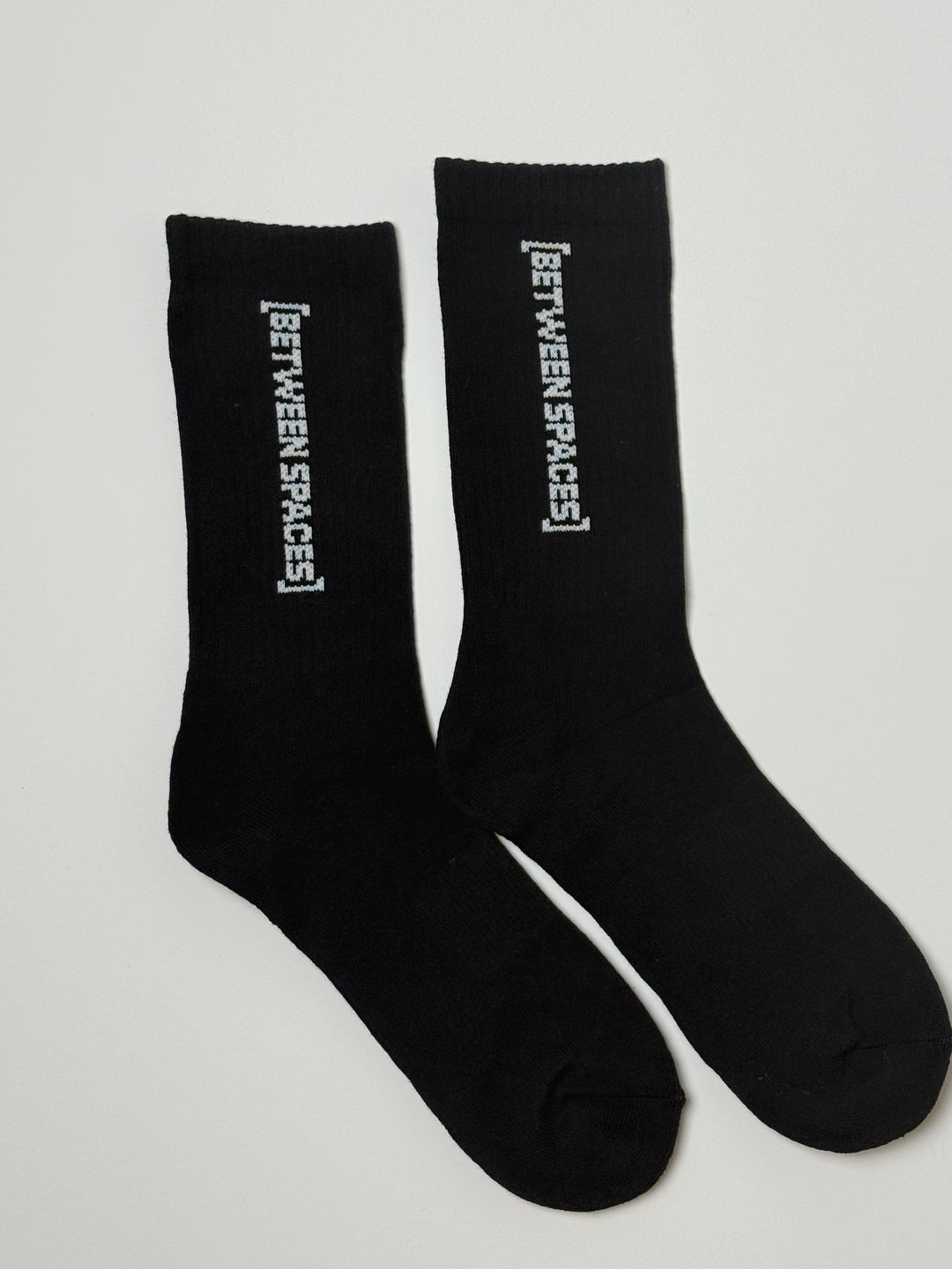 Between Spaces Statement Socks